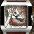 SIHH 2012:   Santos-Dumont XL Hourse Motif   Cartier