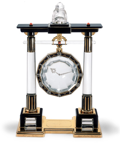 часы с фокусом, разработанные Морисом Куе и известным французским иллюзионистом Жаном-Евгением Робером-Уденом