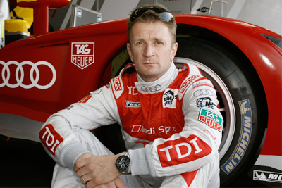 гонщик команды Audi Sport с часами TAG Heuer CARRERA DAY-DATA