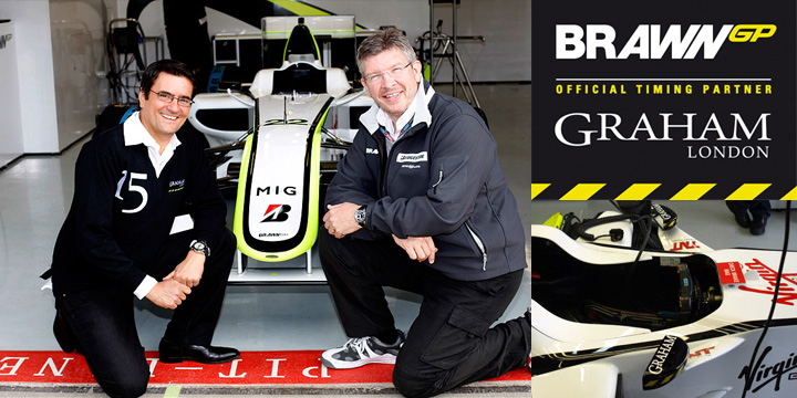 Глава Graham Эрик Лот и лидер Brawn GP Рос Браун на фоне болида «Формулы-1» Brawn GP