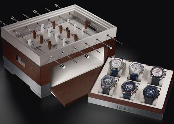 Ebel presents all six of its 1911 Tekton limited editions, in association with Arsenal, Glasgow Rangers, Bayern Munich, AFC Ajax, Olympique Lyonnais and Real Madrid, in a box set in the shape of a table football game © Ebel