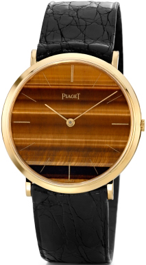 Часы из желтого золота, циферблат из тигрового глаза, механизм Piaget 9P, 1969