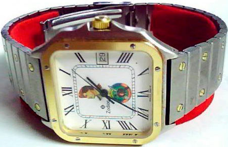 часы Zodiac на циферблате которых изображен ливийский лидер в профиль Муаммар Каддафи